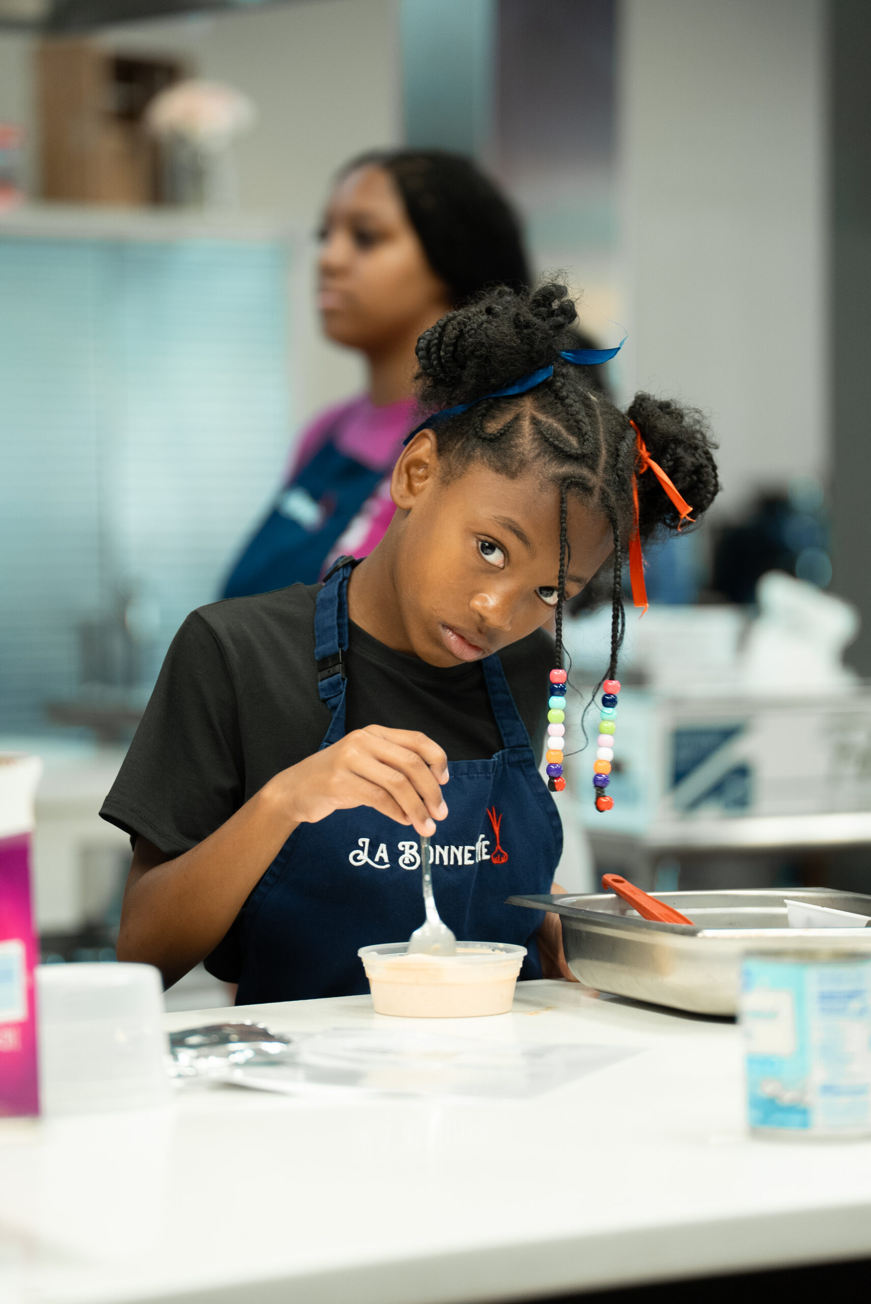 Culinary class prep photo, two girls smiling