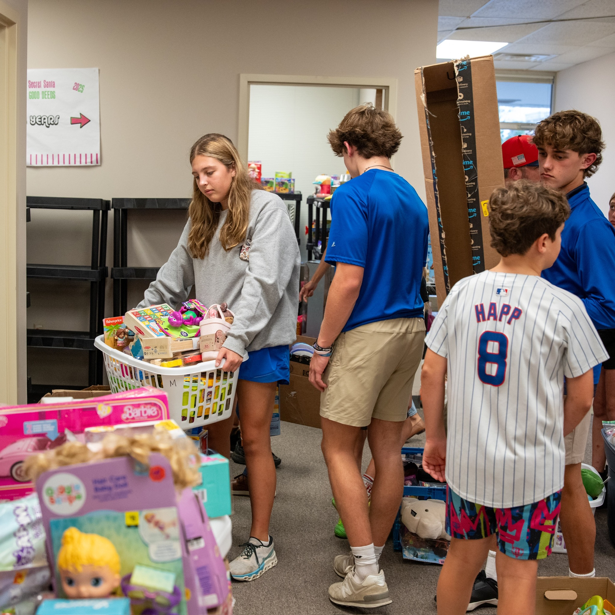 Kentucky Cares volunteers sorting donated toys for Operation Secret Santa